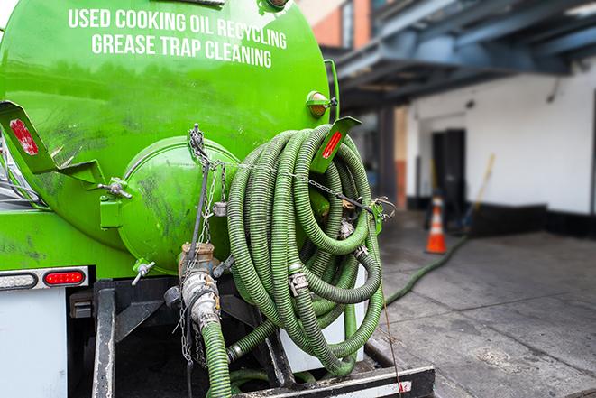 heavy-duty grease trap pumping equipment in action in Dalton PA